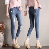 731 # hole jeans girl high waist pencil pants flanging cowboy nine points pants