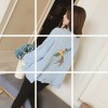 Autumn new Korean fashion pure color loose embroidery hole single-breasted long-sleeved knitted cardigan