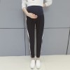 Pregnant women fall and winter leisure care belly pants side white strip pregnant women sports nine pants harem pants 2078