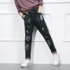 166729 colorful ribbons hole black denim trousers